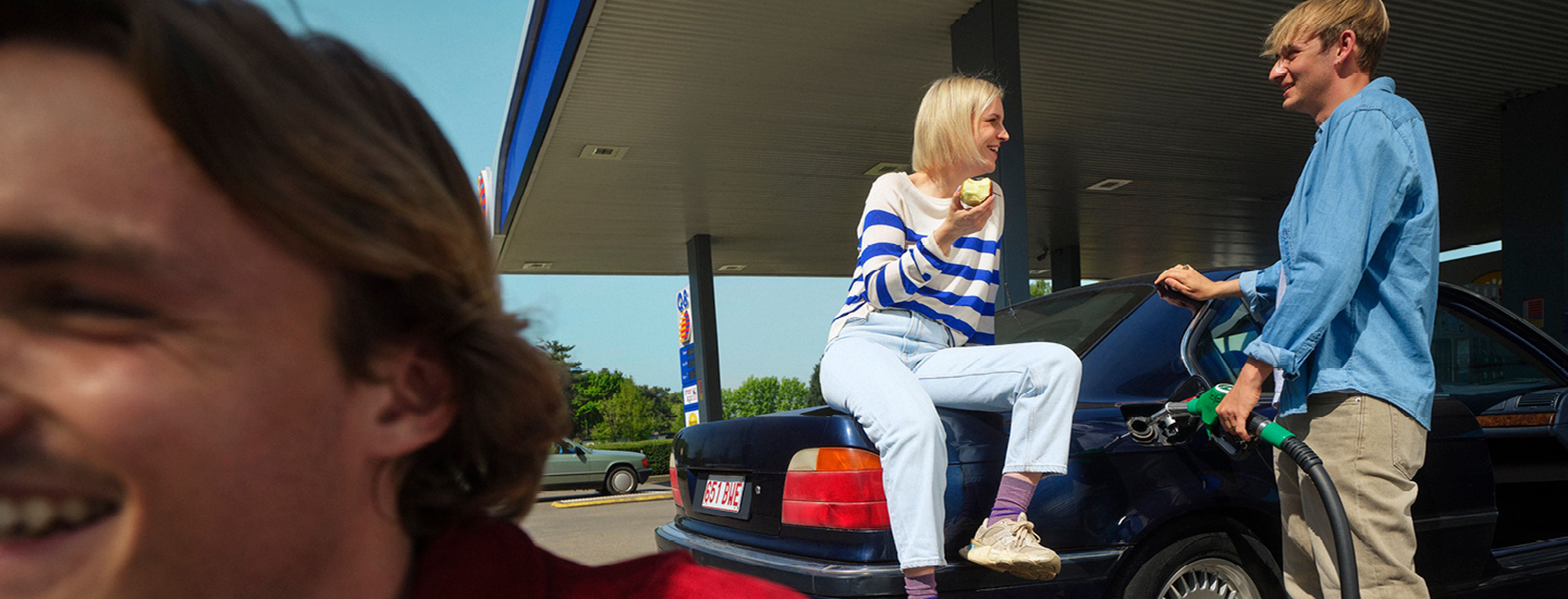 Friends at Q8 petrol station.​